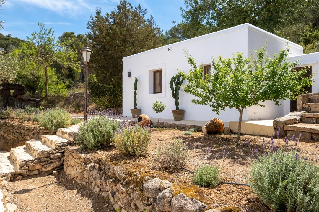 1684146348-Prospectors Luxury real estate Ibiza to rent villa Can Xauret spain property rental garden outside.webp